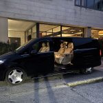 Black Mercedes VIP Class with private driver outside a hotel, transfers to Courchevel